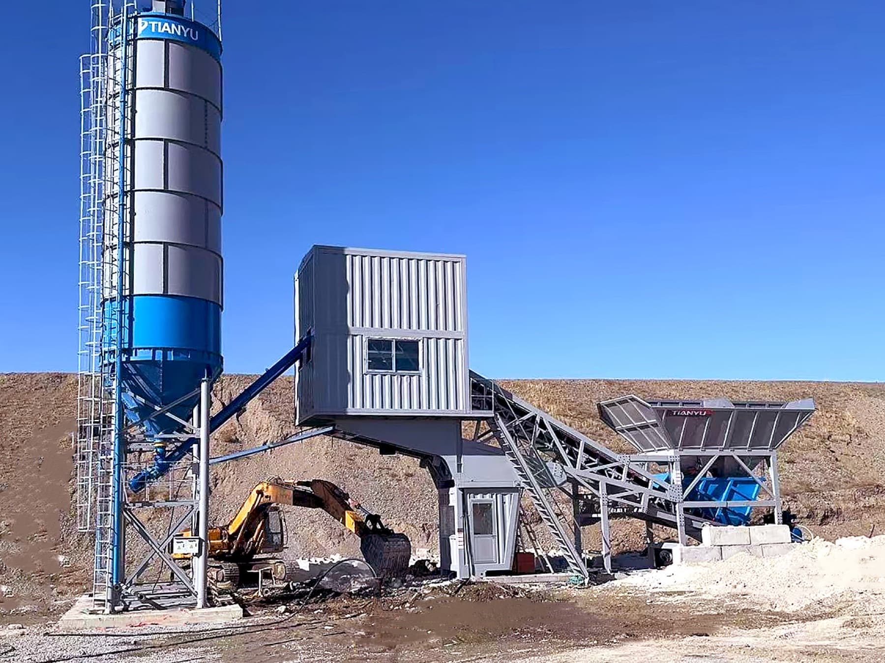 TIANYU HZSY75 mobile plant with control container, silo, and aggregate hopper on an overseas site