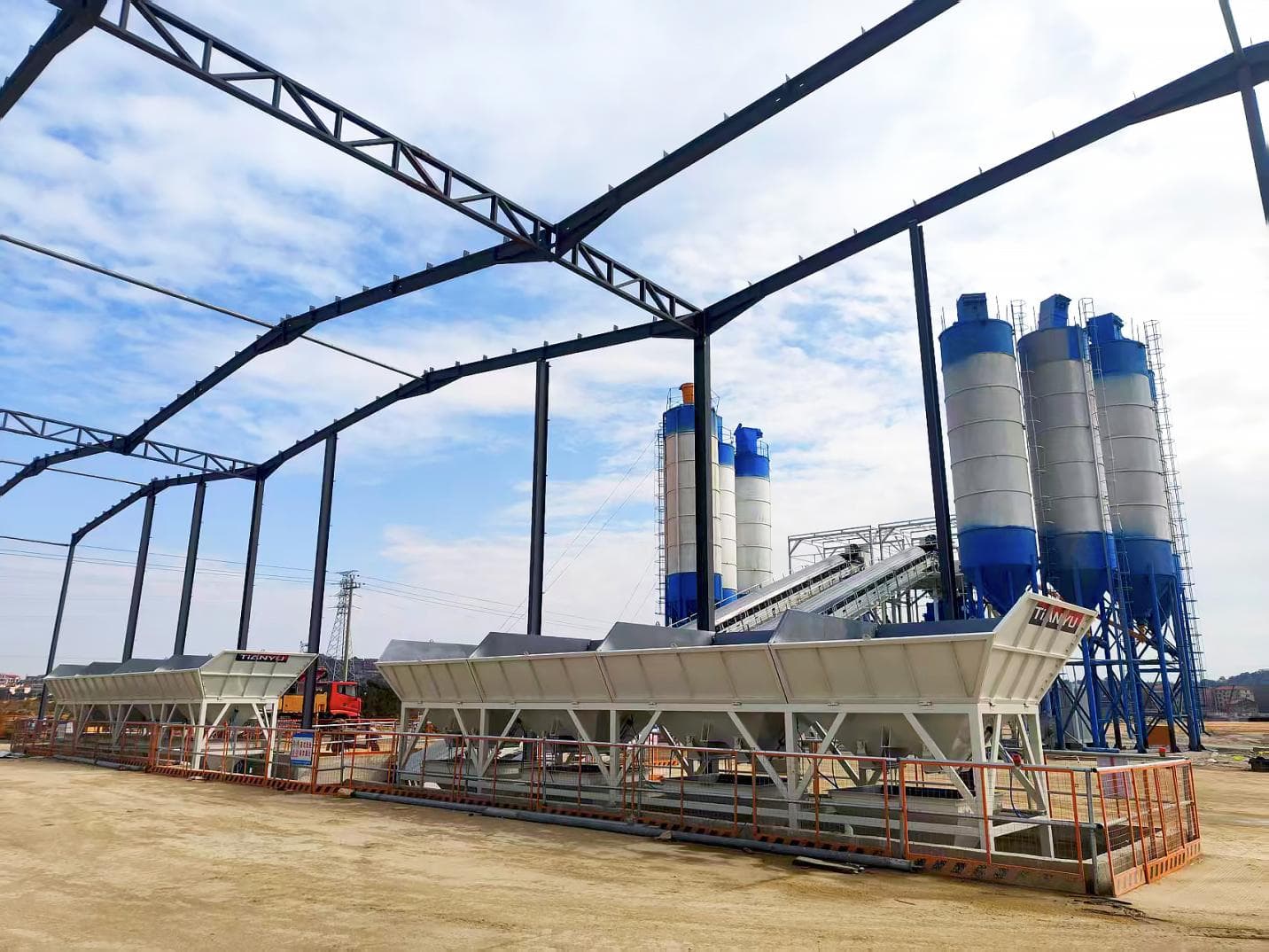 TIANYU twin-line direct-feed plant with aggregate batchers under a steel canopy